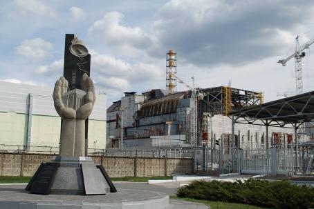 The Chernobyl nuclear power plant. The memorial to the individuals who helped, without any special tools, to clean up the accident and thus helped to “save the world”. The memorial is located about 100 meters from the destroyed block 4. (Source: © Volha Murashka / stock.adobe.com)