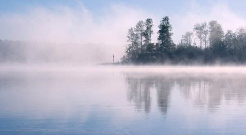 How much water evaporates in 1 hour from 1 m² of water at a temperature of 30 °C?