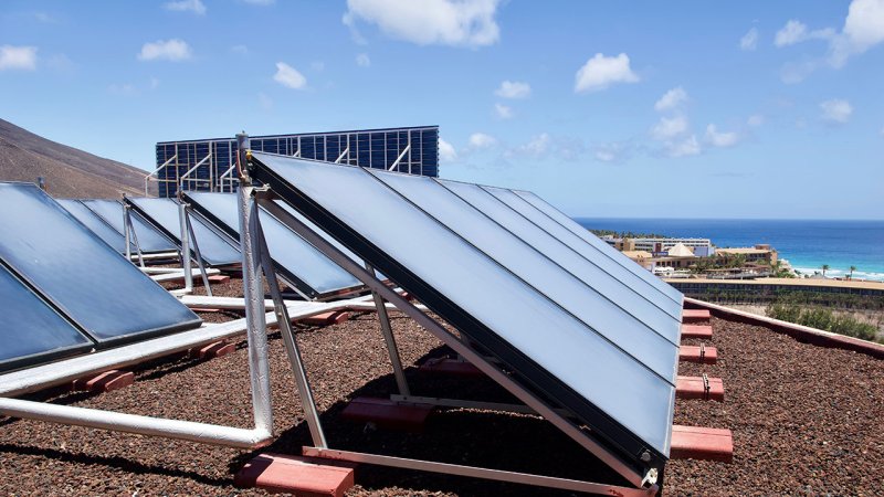 An active solar system utilizing solar radiation to directly heat the heat-transmitting medium in the thermal collectors. (Source: © Wirestock / stock.adobe.com)