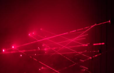 An illustration hinting that high-power lasers and inertial confinement fusion represent another potential pathway toward a future fusion power plant. (Source: © silverkblack / stock.adobe.com)