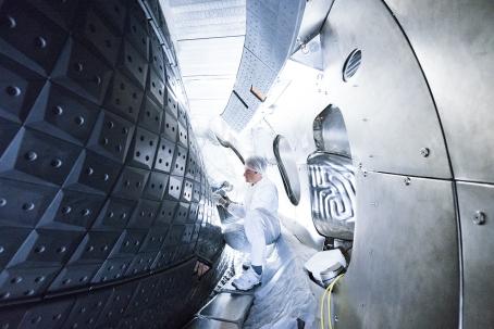 Assembly of graphite tiles in the plasma vessel of Wendelstein 7-X. (Credit: IPP)