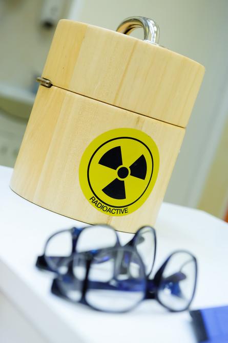 Institutional radioactive emitters are transported in shielded containers and after they expire, they are mostly medium-level waste. They are harmful for hundreds of years. (Source: © Alex Tihonov / stock.adobe.com)