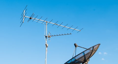 Why are satellite antennas pointed south?