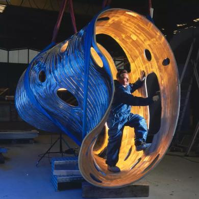 Section of the Wendelstein 7-X vacuum vessel, showing the highly twisted geometry required to match the stellarator’s three-dimensional magnetic field structure. (Credit: IPP, author of photography: Wolfgang Filser)