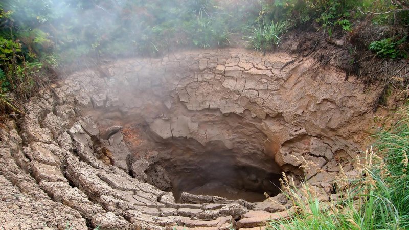 A mud cauldron with steam raising, Kamchatka, Russia. (Source: © Tatiana Grozetskaya / stock.adobe.com)