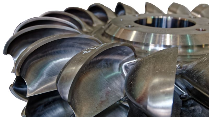 A detail of the spoon shaped blades of the runner of a Pelton turbine. (Source: © hajes / stock.adobe.com)