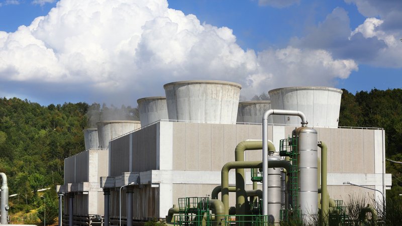 A fan-assisted cooling towers at the Larderello power plant in South Tuscany, Italy. (Source: © Of The Village / stock.adobe.com)