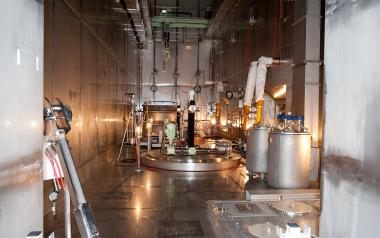 Hot cells enable the safe inspection, processing, and packaging of highly radioactive waste using remotely operated equipment behind thick shielding walls. (Source: &copy; fototrm12 / stock.adobe.com)