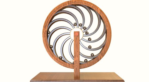 How do "assemblies" which seem to never stop work (swing with balls knocking against each other, spiral water "overflow", ...)?