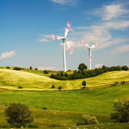 Two wind turbines in the rural region of Molise, Italy. (Source: © ELyrae / stock.adobe.com)