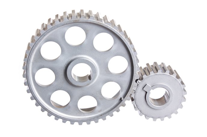 Gearbox principle: while the big wheel spins slowly, the small wheel with fewer teeth makes several turns per revolution of the big wheel and thus spins faster. (Source: © arbalest / stock.adobe.com)