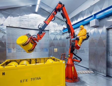 Decommissioning activities also include conditioning radioactive waste into forms suitable for transport and storage. Shielded workplaces and remotely operated equipment are often used for waste handling activities. (Source: © enjoy_life / stock.adobe.com) Decommissioning activities also include conditioning radioactive waste into forms suitable for transport and storage. Shielded workplaces and remotely operated equipment are often used for waste handling activities. (Source: © enjoy_life / stock.adobe.com)